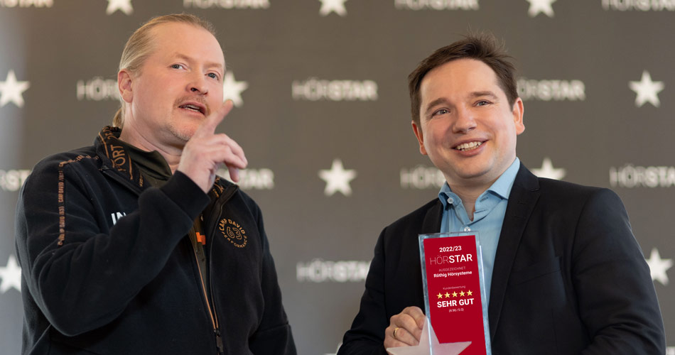 Herr Röthig und Joey Kelly unterhalten sich